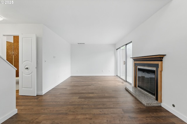 1571 NW Tanasbrook Ct, Beaverton, OR 97006 - unfurnished living room with a premium fireplace, wood finished floors, and baseboards