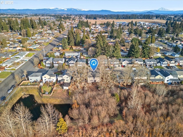 bird's eye view with a mountain view