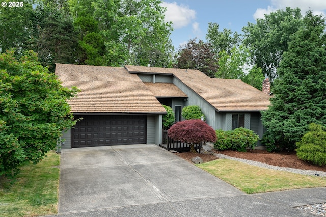 2011 SW 29th Dr, Gresham, OR 97080 - view of front of property with an attached garage, concrete driveway, and a chimney