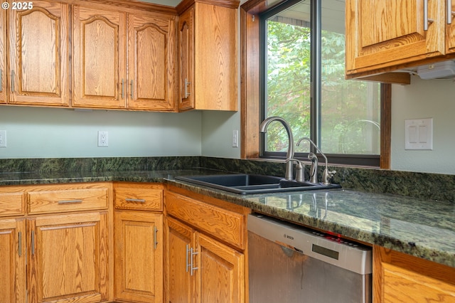 2011 SW 29th Dr, Gresham, OR 97080 - kitchen with dishwasher, brown cabinets, and dark stone counters