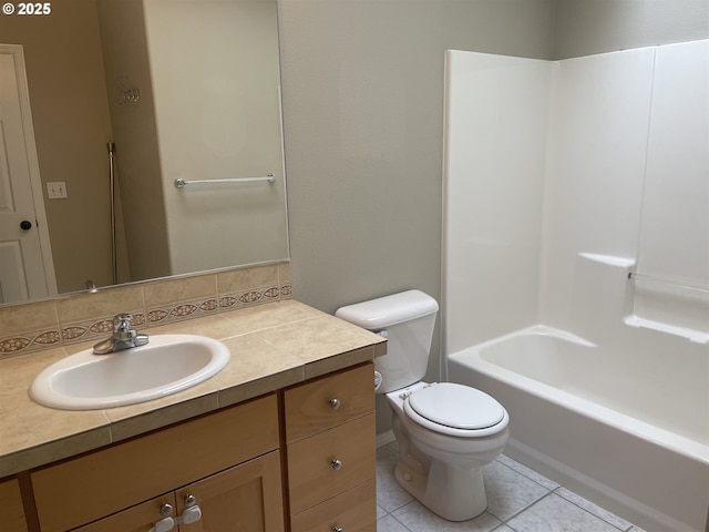 full bathroom with tile patterned flooring, vanity, bathing tub / shower combination, and toilet