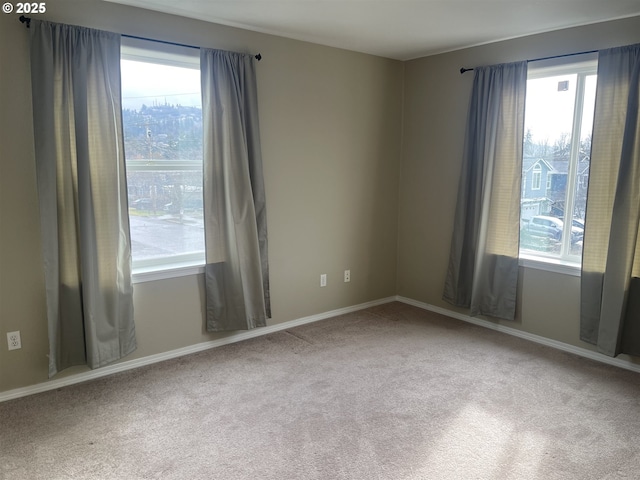 view of carpeted spare room