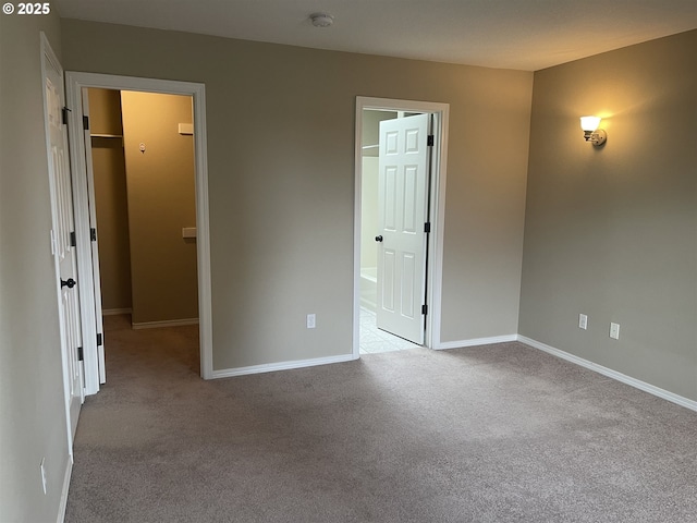 empty room featuring light colored carpet