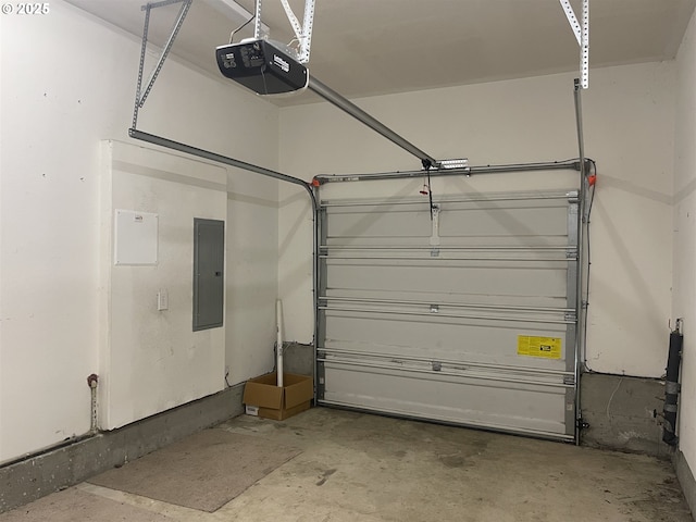 garage featuring a garage door opener and electric panel