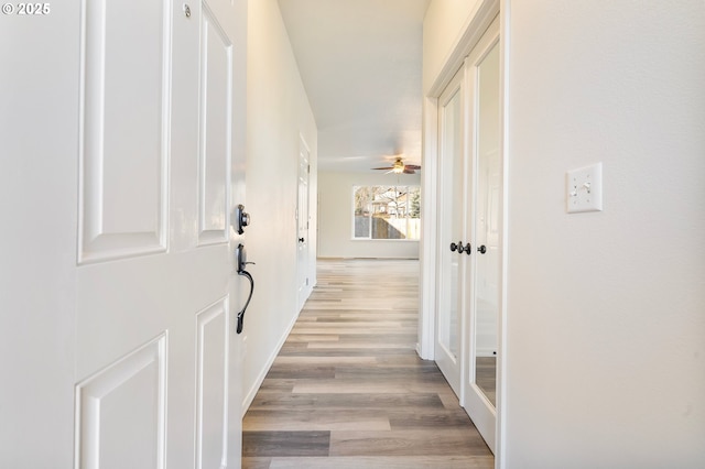 hallway featuring light wood-type flooring