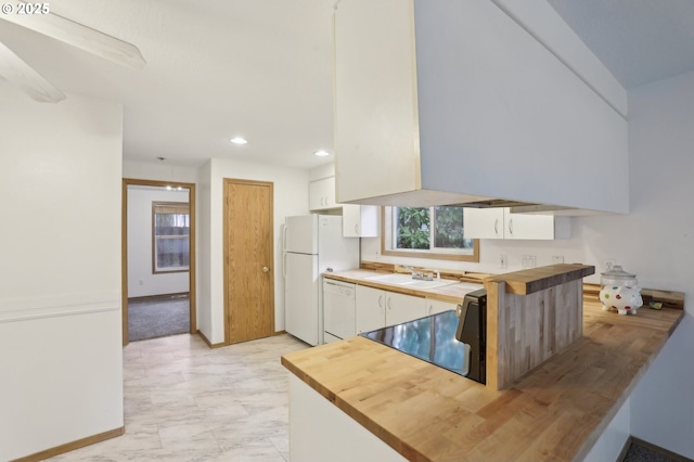 kitchen featuring a sink, marble finish floor, white cabinets, and white appliances