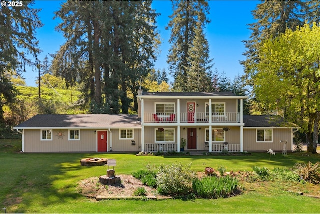35000 SE Bell Maple Dr, Boring, OR 97009 - traditional-style house with an outdoor fire pit, a balcony, a front yard, and covered porch