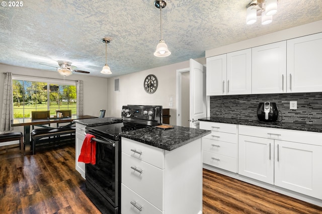 35000 SE Bell Maple Dr, Boring, OR 97009 - kitchen featuring dark wood-style flooring, backsplash, black electric range oven, and white cabinetry