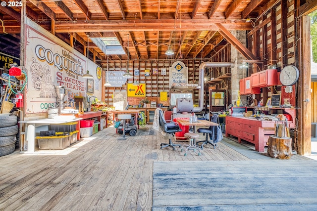 203 N Birch St, Coquille, OR 97423 - miscellaneous room featuring a workshop area and wood-type flooring