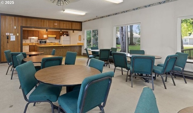 2712 SE 138th Ave Unit 53, Portland, OR 97236 - dining space with wood walls