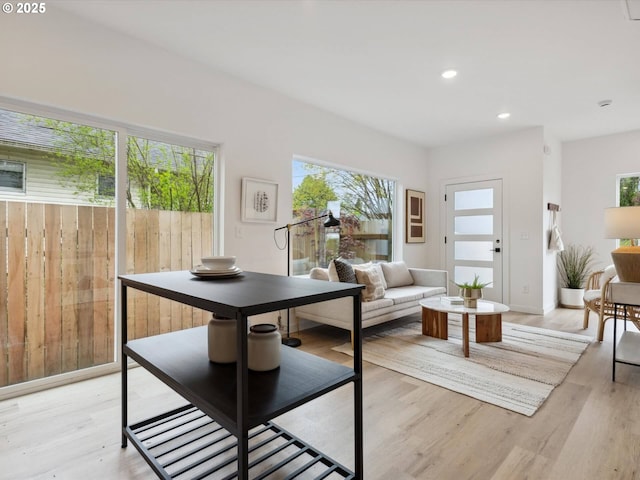 1534 N Schofield St, Portland, OR 97217 - living room featuring light wood-style floors, recessed lighting, and baseboards