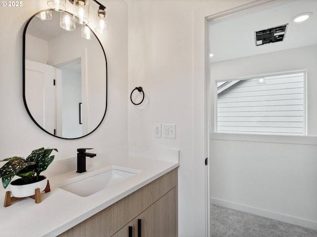 1534 N Schofield St, Portland, OR 97217 - bathroom featuring vanity, recessed lighting, and baseboards