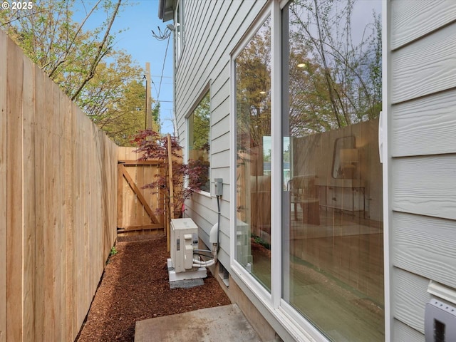 1534 N Schofield St, Portland, OR 97217 - exterior space with fence, a cooling unit, and a gate