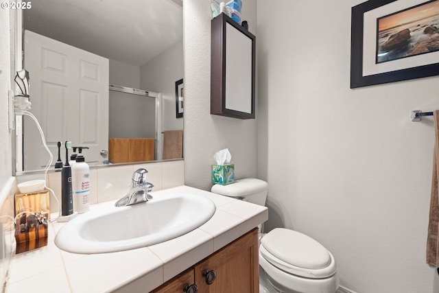 17019 SW Glen Park Ct, Beaverton, OR 97003 - bathroom with vanity, toilet, and an enclosed shower