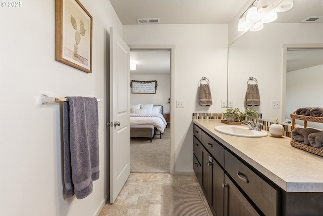 12810 NE 118th Way, Vancouver, WA 98682 - bathroom featuring ensuite bath, vanity, and baseboards
