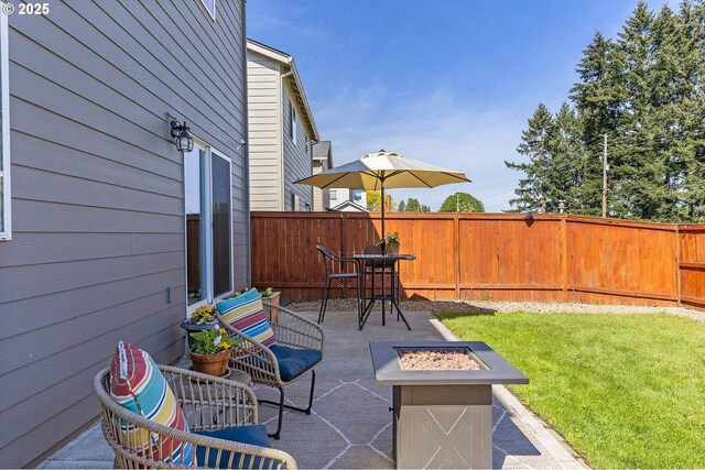 12810 NE 118th Way, Vancouver, WA 98682 - view of patio / terrace with a fire pit