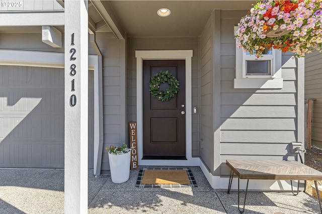 12810 NE 118th Way, Vancouver, WA 98682 - doorway to property with a garage