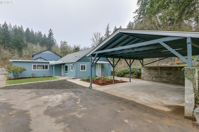 view of parking with a carport