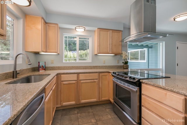 kitchen featuring light brown cabinets, sink, plenty of natural light, island exhaust hood, and stainless steel appliances