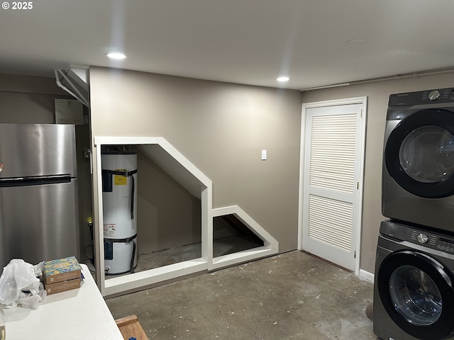 4523 NE 105th Ave, Portland, OR 97220 - laundry room featuring stacked washing machine and dryer, strapped water heater, and recessed lighting