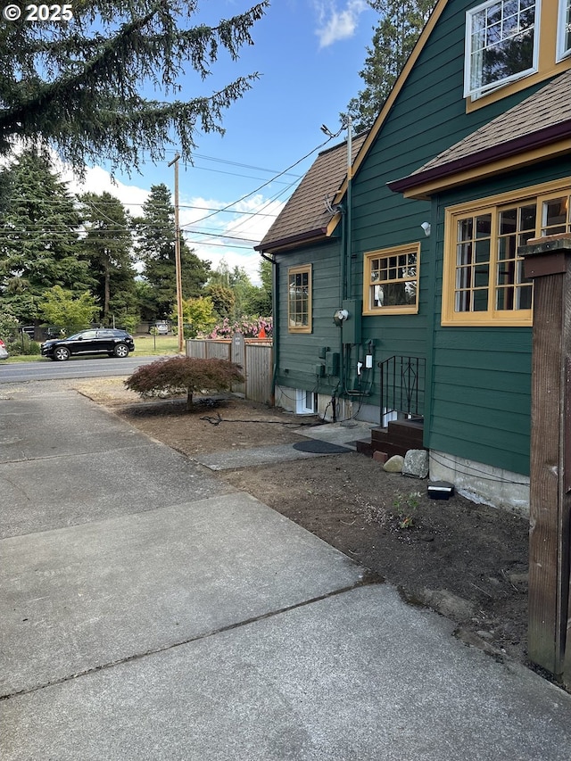 4523 NE 105th Ave, Portland, OR 97220 - view of property exterior with roof with shingles