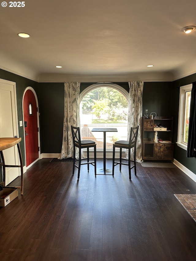 4523 NE 105th Ave, Portland, OR 97220 - dining room with dark wood-type flooring, arched walkways, and recessed lighting