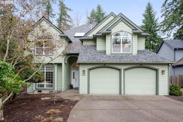 view of front of property featuring a garage