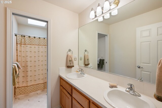 bedroom featuring light colored carpet, a closet, and a textured ceiling