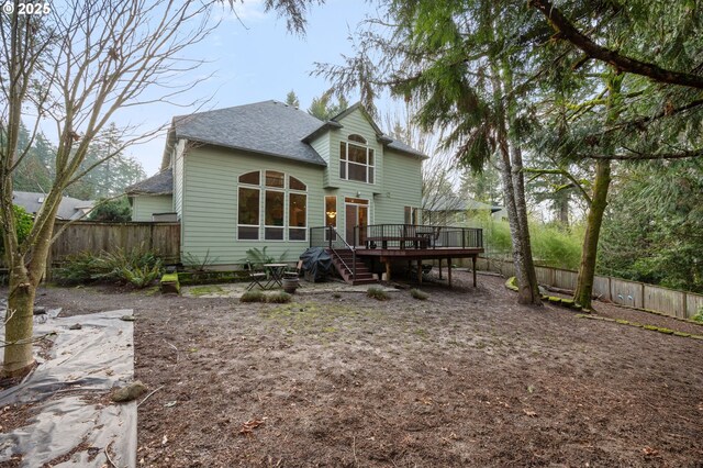 view of patio with a deck and a grill