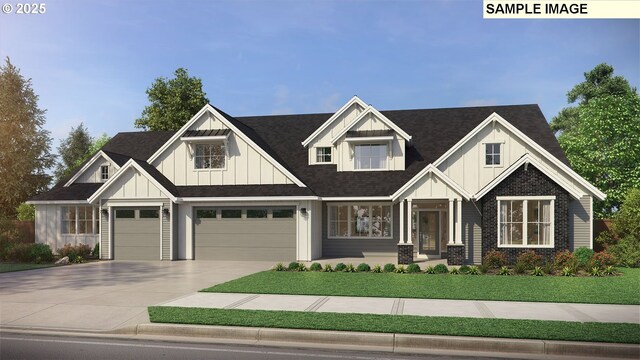 view of front of house featuring a garage, concrete driveway, a front yard, board and batten siding, and brick siding