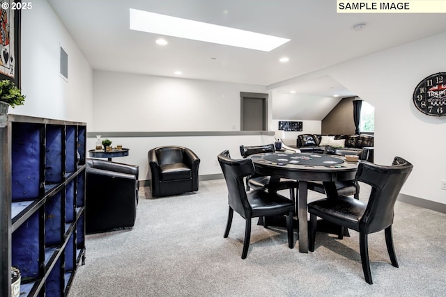 28006 NE 168th Ave, Battle Ground, WA 98604 - carpeted dining space featuring vaulted ceiling with skylight, visible vents, baseboards, and recessed lighting