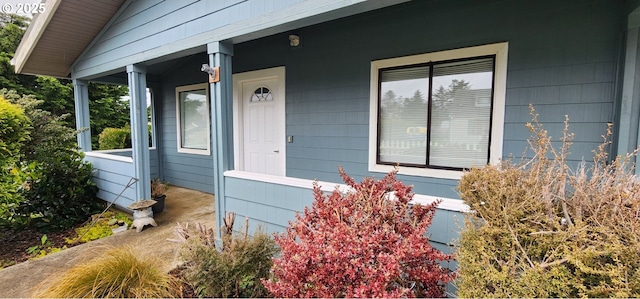 94237 6th St, Gold Beach, OR 97444 - doorway to property with covered porch