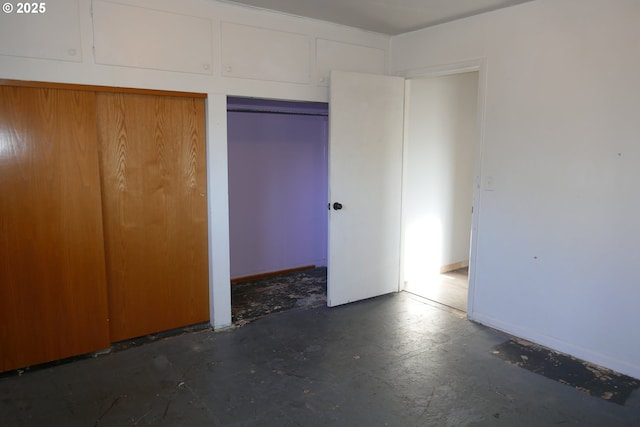 unfurnished bedroom with a closet