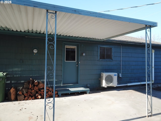 doorway to property featuring ac unit