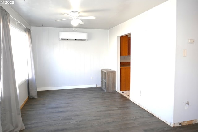 unfurnished dining area featuring ceiling fan, dark hardwood / wood-style flooring, and a wall mounted AC