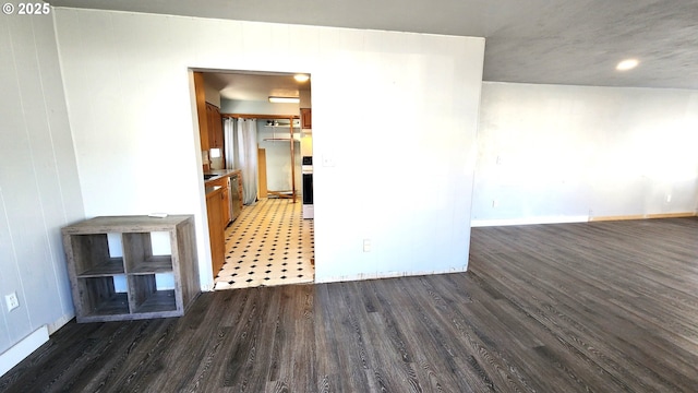 interior space with dark hardwood / wood-style floors