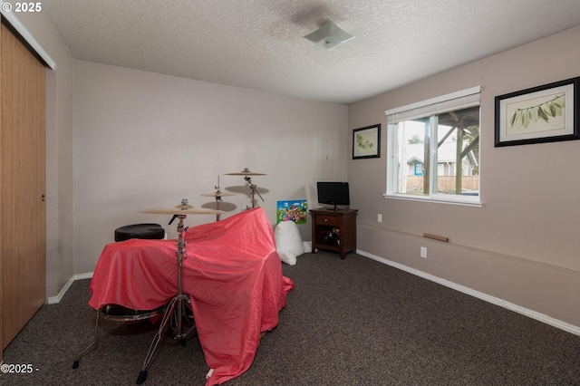 3158 SW Beach Ave, Lincoln City, OR 97367 - game room with carpet, a textured ceiling, and baseboards