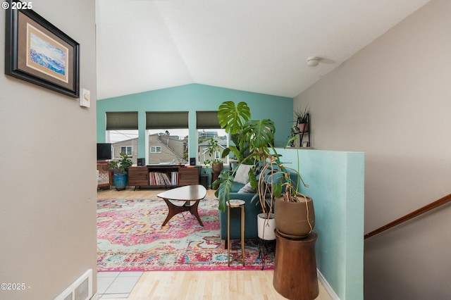 3158 SW Beach Ave, Lincoln City, OR 97367 - living area featuring vaulted ceiling and wood finished floors