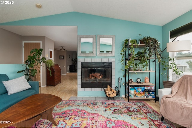 3158 SW Beach Ave, Lincoln City, OR 97367 - living area with lofted ceiling, wood finished floors, and a fireplace with flush hearth