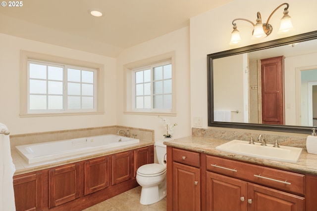 full bath with toilet, a garden tub, vanity, and tile patterned floors