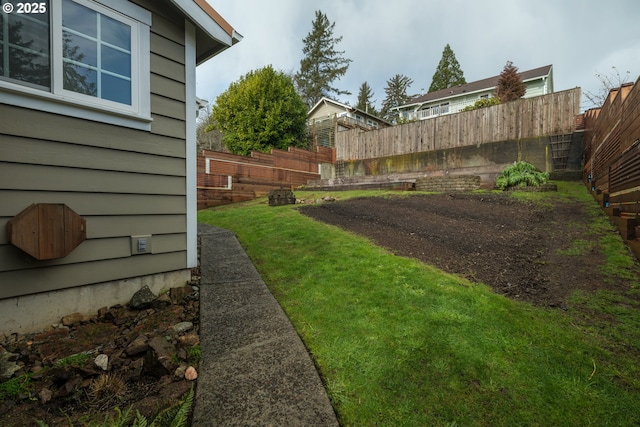 view of yard featuring fence