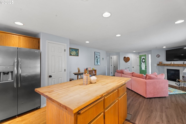 3218 SW Corbeth Ln, Troutdale, OR 97060 - kitchen with stainless steel refrigerator with ice dispenser, wood counters, light wood finished floors, recessed lighting, and a center island