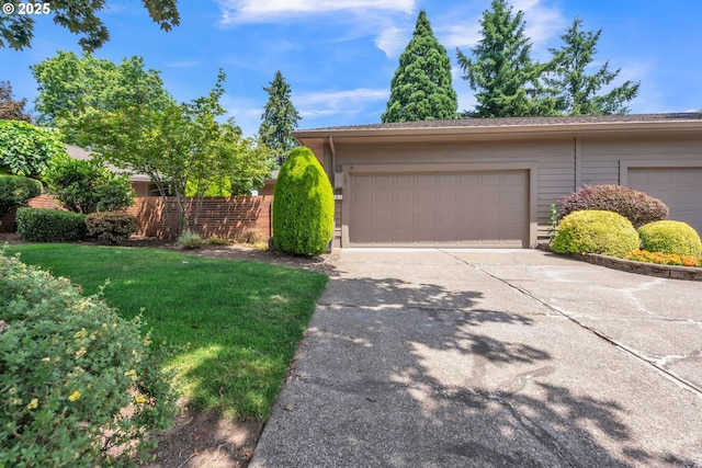 8085 SW Fairway Dr, Wilsonville, OR 97070 - view of front facade featuring concrete driveway and a garage