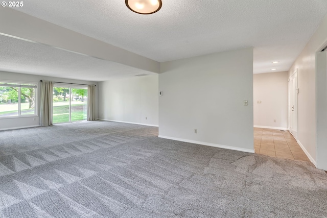 8085 SW Fairway Dr, Wilsonville, OR 97070 - spare room with light colored carpet, a textured ceiling, and recessed lighting