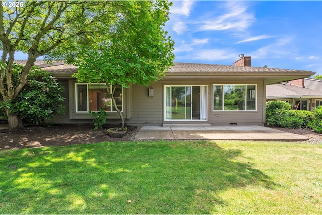 8085 SW Fairway Dr, Wilsonville, OR 97070 - back of property featuring a chimney, a patio, and a yard