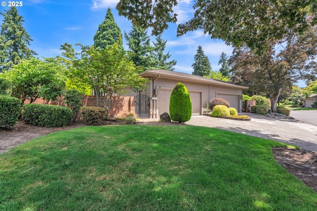 8085 SW Fairway Dr, Wilsonville, OR 97070 - view of front facade with driveway, a garage, and brick siding