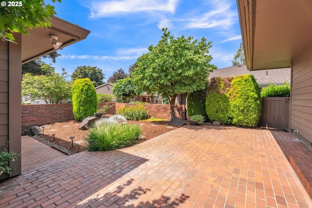 8085 SW Fairway Dr, Wilsonville, OR 97070 - fenced backyard with a patio area
