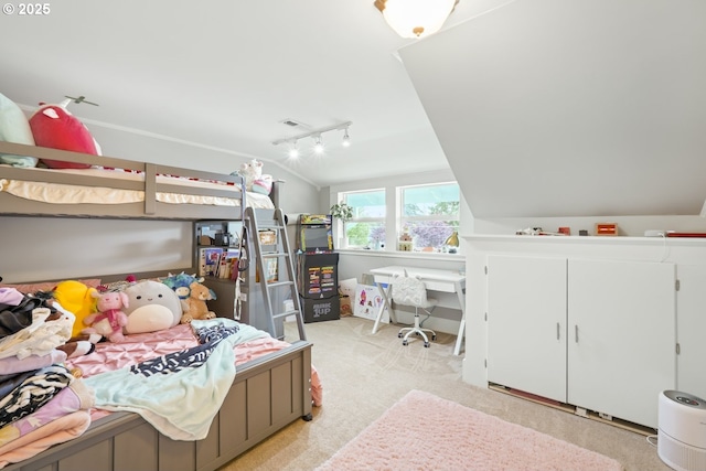 3327 4th St, Hubbard, OR 97032 - bedroom with lofted ceiling, light colored carpet, and rail lighting
