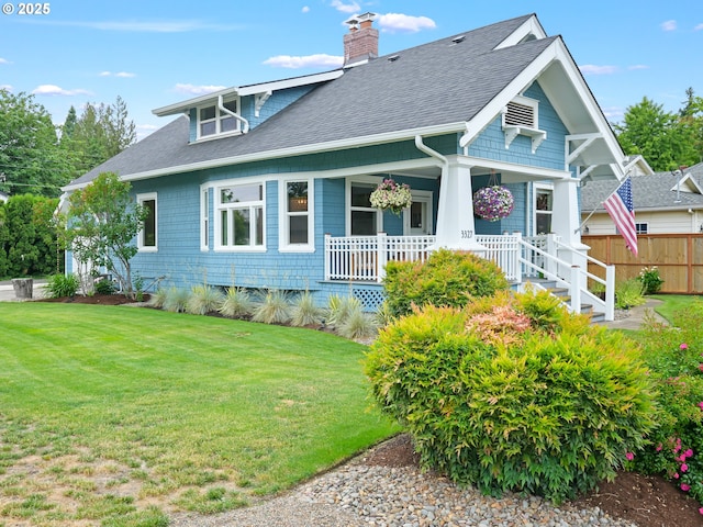3327 4th St, Hubbard, OR 97032 - rear view of house with a shingled roof, a chimney, and a porch