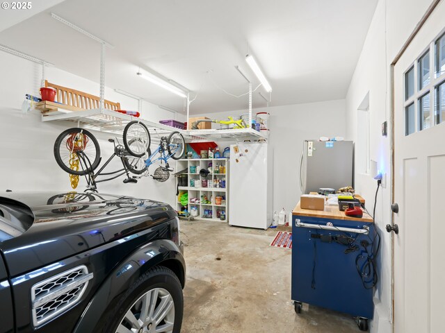 3327 4th St, Hubbard, OR 97032 - garage with freestanding refrigerator